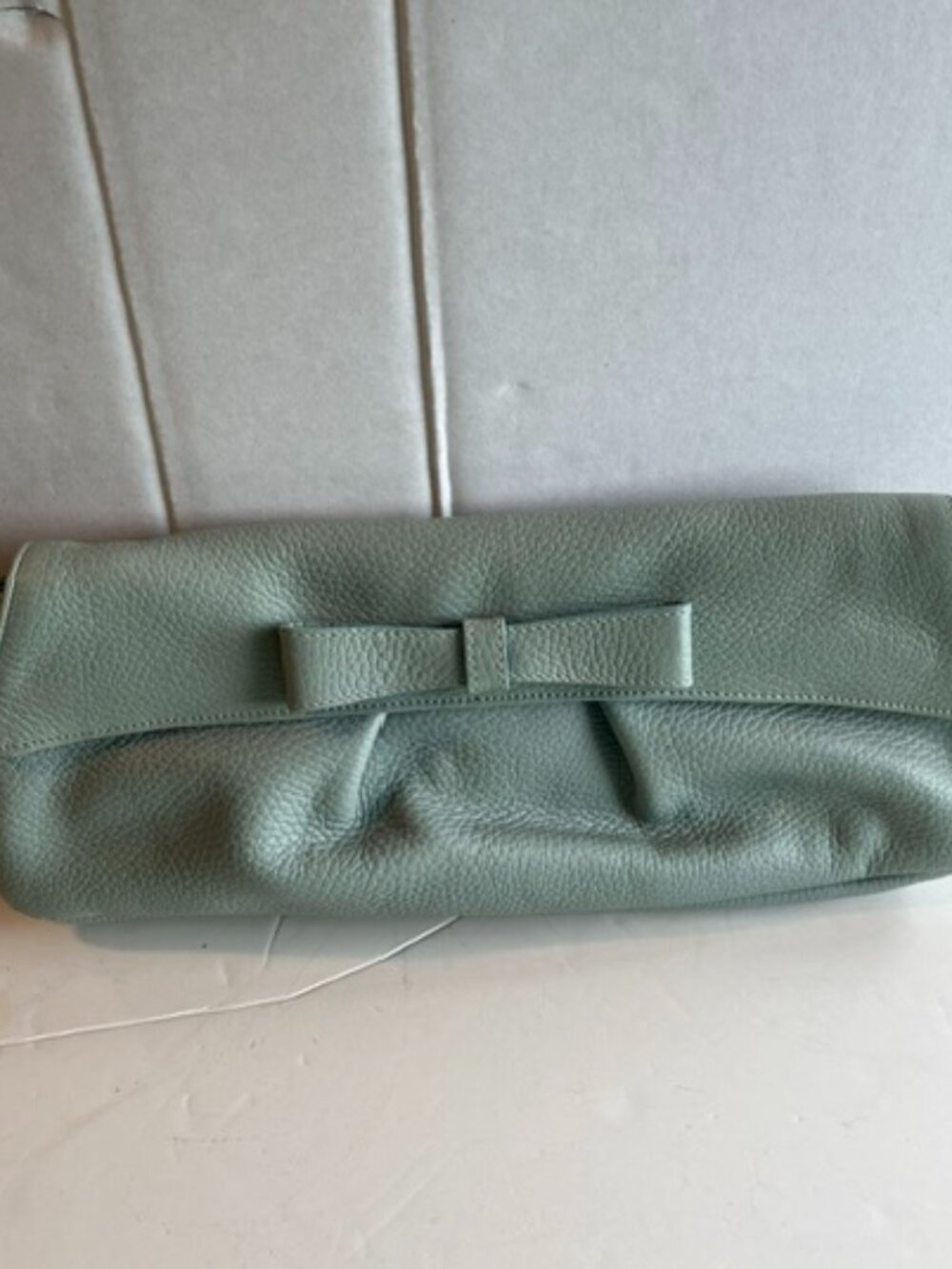 Claudia Firenze leather clutch.